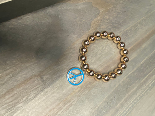 GOLD WITH PEACE SIGN BRACELET