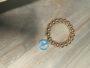 GOLD WITH PEACE SIGN BRACELET
