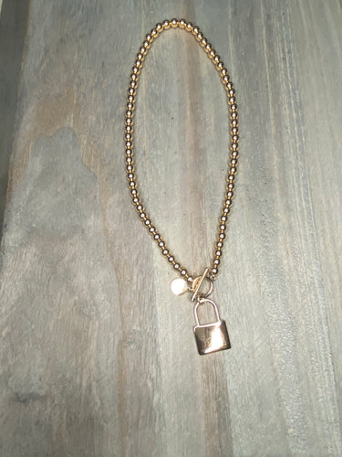 GOLD LOCK NECKLACE